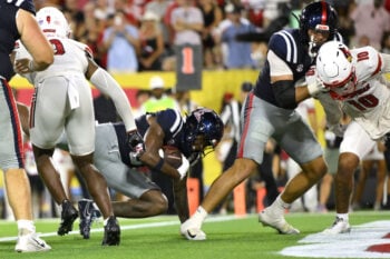 Sep 6, 2026; Nashville, Tennessee, USA;  Mississippi Rebels running back Kewan Lacy (5) carries the ball for a touchdown against the Louisville Cardinals during the second quarter at Nissan Stadium.  Mandatory Credit: Steve Roberts-Imagn Images
