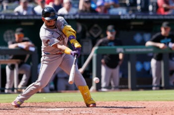 Sep 7, 2026; Kansas City, Missouri, USA;  Arizona Diamondbacks catcher Gabriel Moreno (14) hits a single during the ninth inning against the Kansas City Royals at Kauffman Stadium.  Mandatory Credit: William Purnell-Imagn Images
