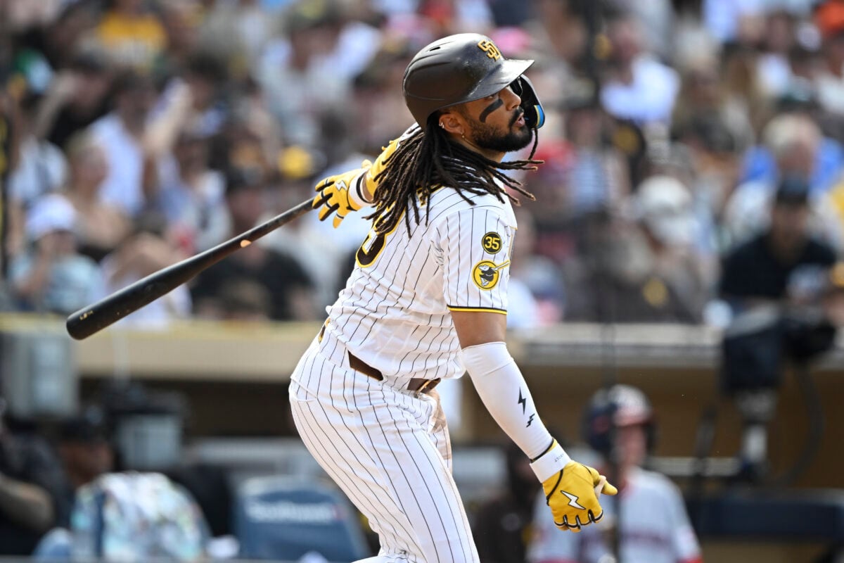 Sep 7, 2026; San Diego, California, USA; San Diego Padres right fielder Fernando Tatis Jr. (23) hits a single during the third inning against the Washington Nationals at Petco Park. Mandatory Credit: Denis Poroy-Imagn Images