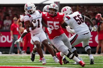 Ohio State Buckeyes defensive tackle John Walker (55) pursues Ball State Cardinals running back TJ Horton (4) during the NCAA football game at Ohio Stadium in Columbus on Sept. 5, 2026.