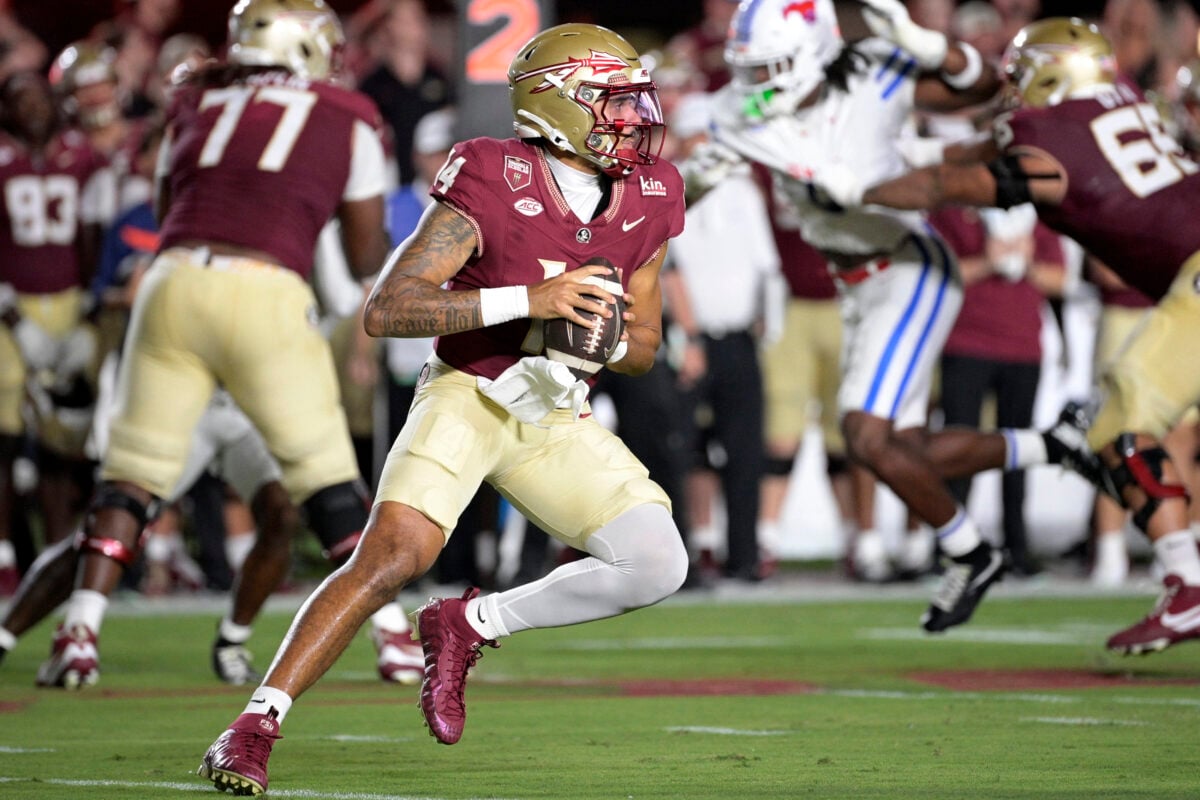 Sep 7, 2026; Tallahassee, Florida, USA;  Florida State Seminoles quarterback Ashton Daniels (14) looks to pass against the Southern Methodist Mustangs during the first half at Doak S. Campbell Stadium.  Mandatory Credit: Melina Myers-Imagn Images