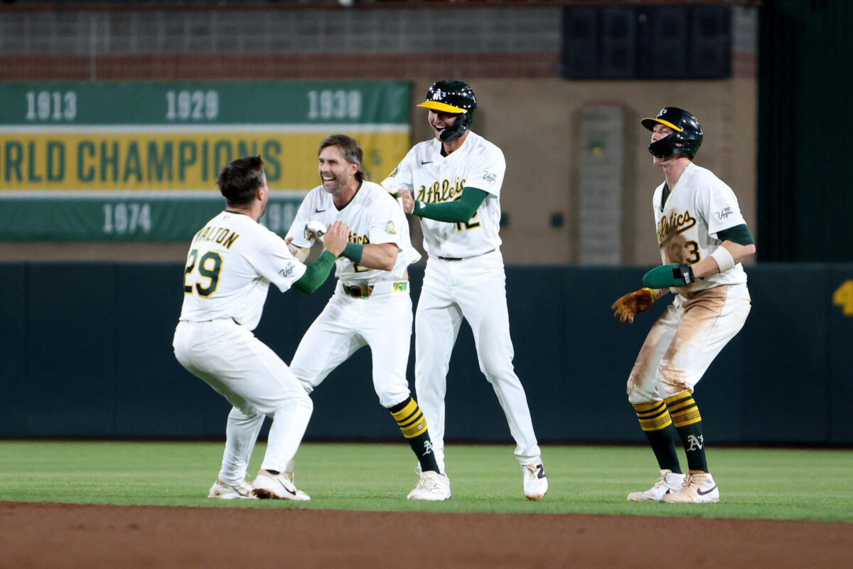 Sep 7, 2026; West Sacramento, California, USA; Athletics infielder Jeff McNeil (22) celebrates with teammates after hitting a walk-off infield RBI single against Toronto Blue Jays pitcher Louis Varland (not pictured) during the ninth inning at Sutter Health Park. Mandatory Credit: Dennis Lee-Imagn Images