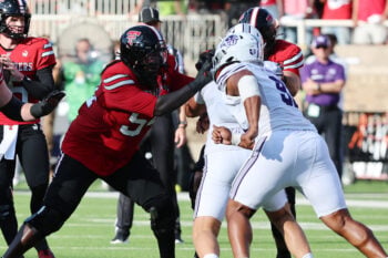 Sep 5, 2026; Lubbock, Texas, USA;  Texas Tech Red Raiders offensive guard Jordan Church (54) blocks for quarterback Will Hammond (15) in the first half against the Abilene Christian Wildcats at Galaxy Stadium. Mandatory Credit: Michael C. Johnson-Imagn Images