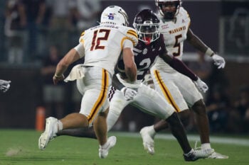 Sep 5, 2026; Starkville, Mississippi, USA; Mississippi State Bulldogs cornerback Quentin Taylor (24) attempts to tackle Louisiana Monroe Warhawks quarterback Austin Carlisle (12) during the fourth quarter at Davis Wade Stadium at Scott Field. Mandatory Credit: Petre Thomas-Imagn Images