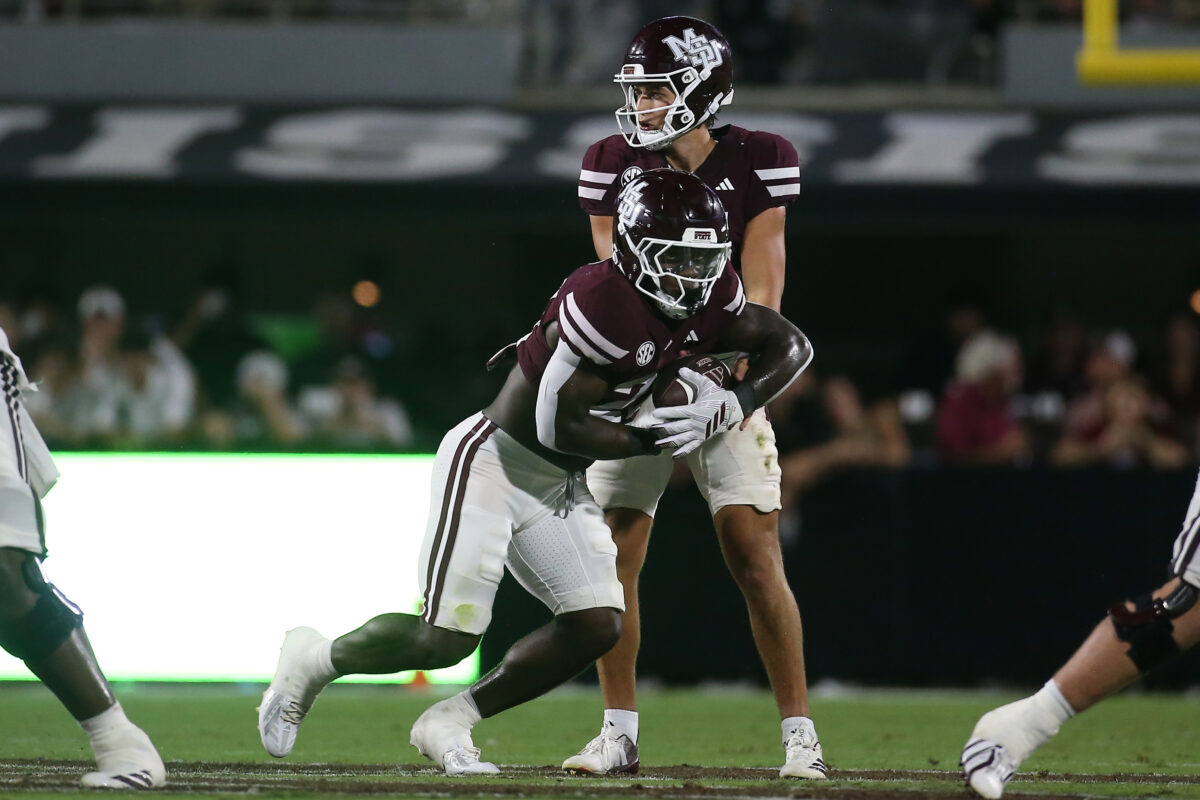 Sep 5, 2026; Starkville, Mississippi, USA; Mississippi State Bulldogs quarterback Parker Puckett (15) hands the ball off to running back J.J. Hill (21) during the fourth quarter against the Louisiana Monroe Warhawks  at Davis Wade Stadium at Scott Field. Mandatory Credit: Petre Thomas-Imagn Images