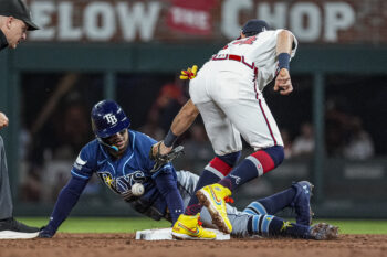 Sep 8, 2026; Cumberland, Georgia, USA; Tampa Bay Rays right fielder Victor Mesa Jr. (25) steals second base behind Atlanta Braves shortstop Mauricio Dubon (14) during the third inning at Truist Park. Mandatory Credit: Dale Zanine-Imagn Images