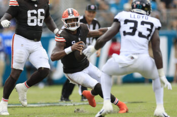 Cleveland Browns quarterback Deshaun Watson (4) tries to elude Jacksonville Jaguars linebacker Devin Lloyd (33) during the second quarter of their NFL game on Sept. 15, 2024 at EverBank Stadium in Jacksonville, Fla. The Browns defeated the Jaguars 18-13. [Corey Perrine/Florida Times-Union]