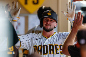Sep 9, 2026; San Diego, California, USA;  San Diego Padres center fielder Jackson Merrill (3) celebrates in the dugout after hitting a one run home run during the seventh inning against the Washington Nationals at Petco Park.  Mandatory Credit: David Frerker-Imagn Images