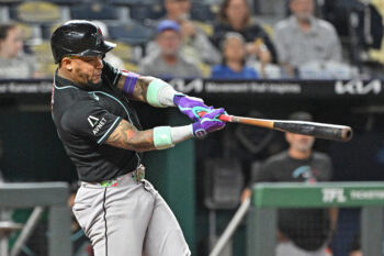 Sep 9, 2026; Kansas City, Missouri, USA;  Arizona Diamondbacks designated hitter Ketel Marte (4) drives in a run with a single in the fifth inning against the Kansas City Royals at Kauffman Stadium.  Mandatory Credit: Peter Aiken-Imagn Images