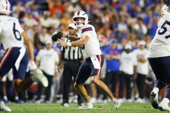 Sep 5, 2026; Gainesville, Florida, USA; Florida Atlantic Owls quarterback Caden Veltkamp (10) looks to throw against the Florida Gators during the second half at Ben Hill Griffin Stadium. Mandatory Credit: Matt Pendleton-Imagn Images