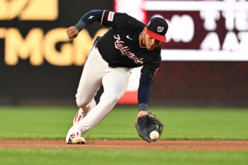 Sep 11, 2026; Washington, District of Columbia, USA;  Washington Nationals infielder Jorbit Vivas (84) scoops up a ground ball in the second inning against the Los Angeles Angels at Nationals Park. Mandatory Credit: Jamie Sabau-Imagn Images