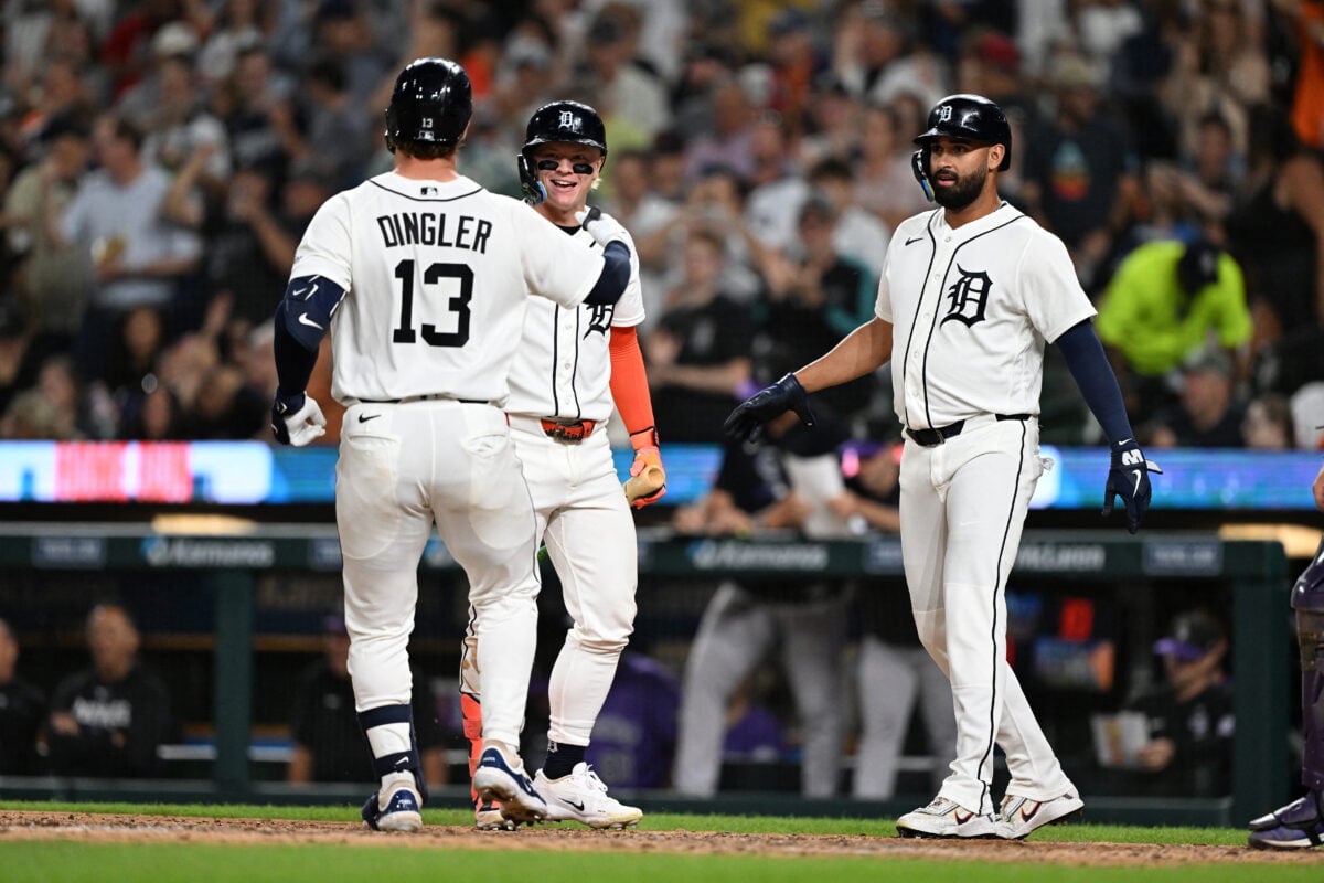 Sep 11, 2026; Detroit, Michigan, USA;  Detroit Tigers catcher Dillon Dingler (13) celebrates at home plate with teammates Max Clark (center) and Riley Greene (right) after hitting a two-run home run against the Colorado Rockies in the sixth inning at Comerica Park.  Mandatory Credit: Lon Horwedel-Imagn Images