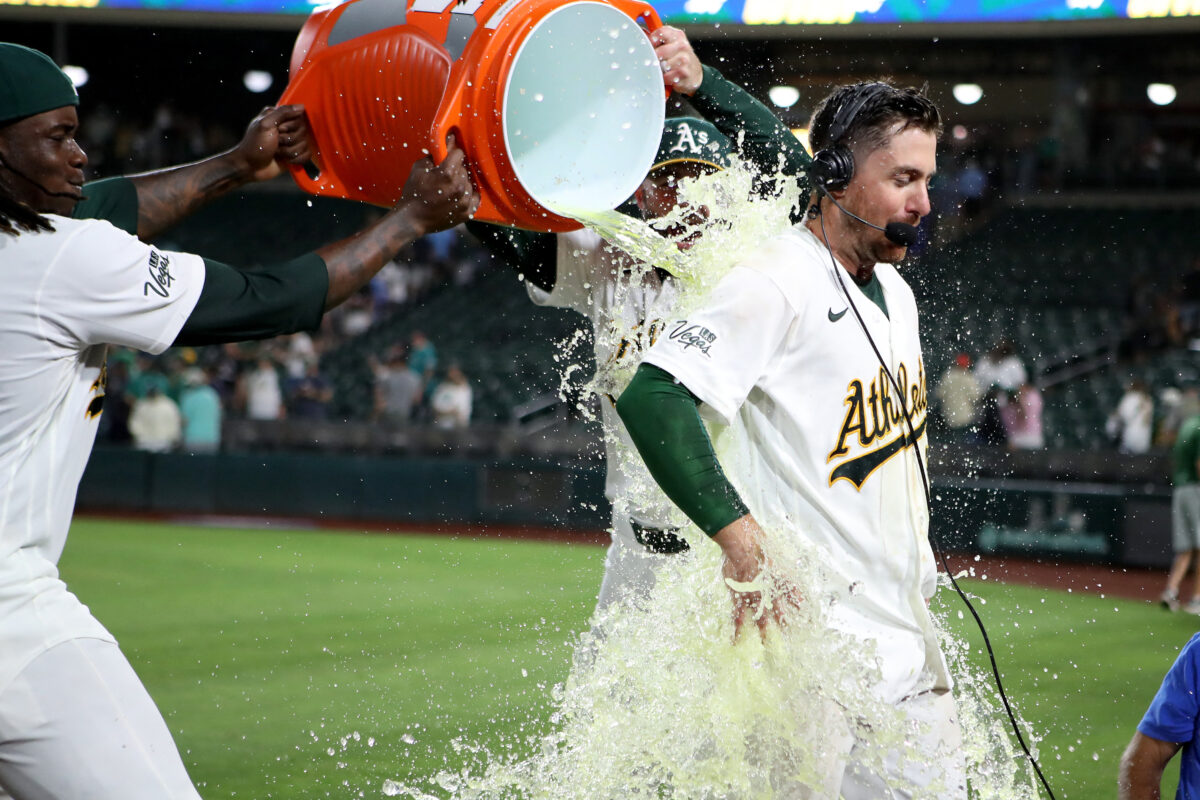 Sep 11, 2026; West Sacramento, California, USA;  Athletics short stop Donovan Walton (29) is doused with Gatorade after hitting a walk-off two-run home run against Seattle Mariners pitcher Eduard Bazardo (not pictured) at Sutter Health Park.  Mandatory Credit: Dennis Lee-Imagn Images