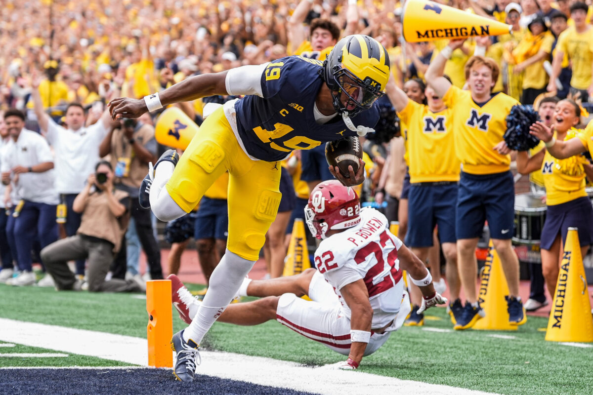 Michigan quarterback Bryce Underwood (19) runs into the end zone for a touchdown against Oklahoma during the first half at Michigan Stadium in Ann Arbor on Saturday, Sept. 12, 2026.