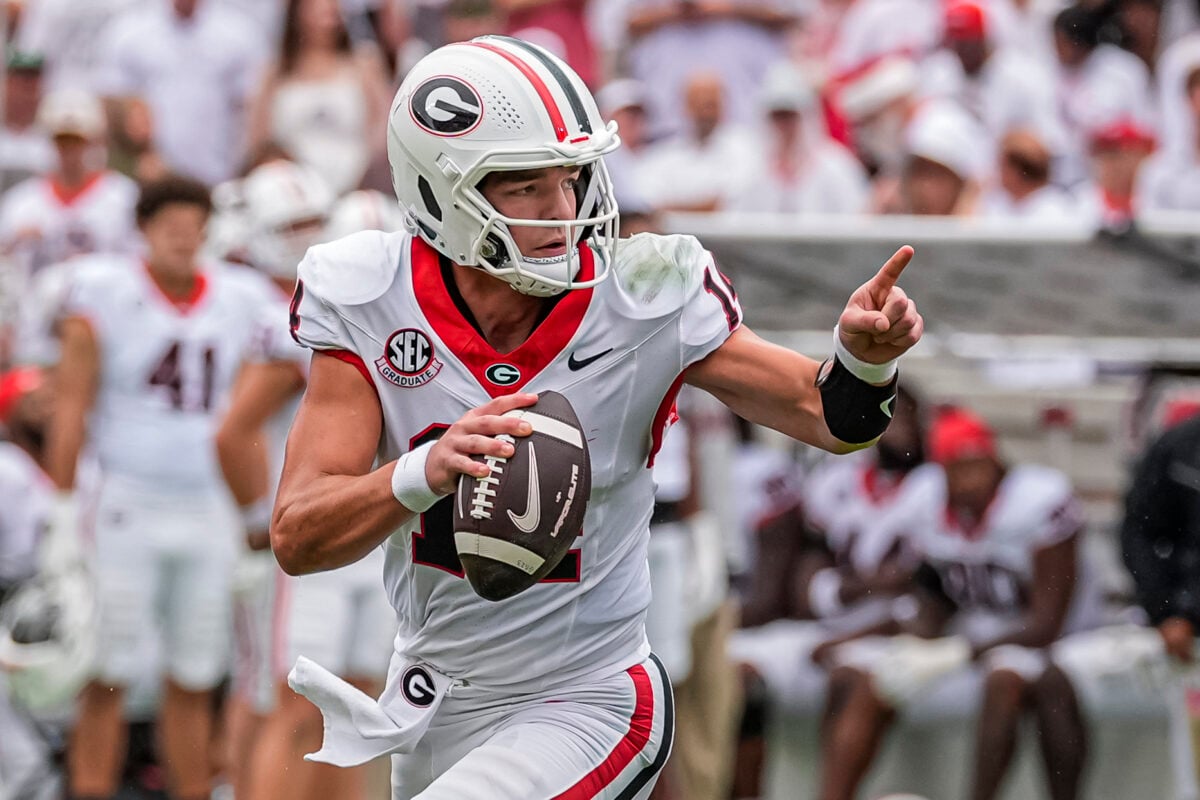 Sep 12, 2026; Athens, Georgia, USA;  Georgia Bulldogs quarterback Gunner Stockton (14) rolls out and runs against the Western Kentucky Hilltoppers during the first half at Sanford Stadium.  Mandatory Credit: Dale Zanine-Imagn Images