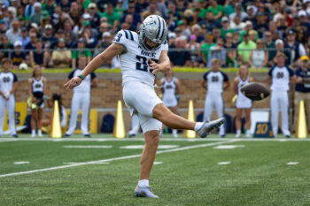 Sep 12, 2026; South Bend, Indiana, USA;  Rice Owls kicker Charlie Durkin (29) punts against the Notre Dame Fighting Irish during the first half at Notre Dame Stadium.  Mandatory Credit: Michael Caterina-Imagn Images