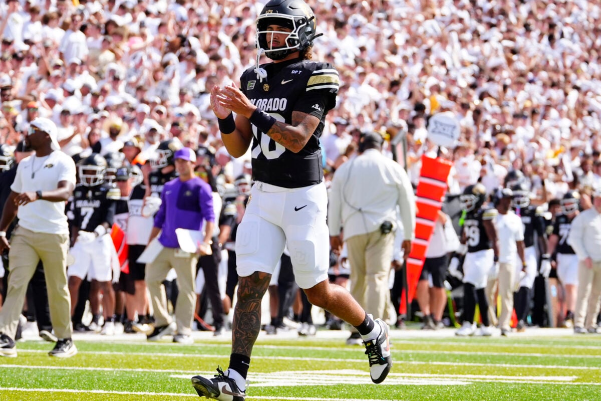 Sep 12, 2026; Boulder, Colorado, USA;  Colorado Buffaloes quarterback Julian Lewis (10) reacts following a touchdown pass in the second quarter against the Weber State Wildcats at Folsom Field.  Mandatory Credit: Ron Chenoy-Imagn Images