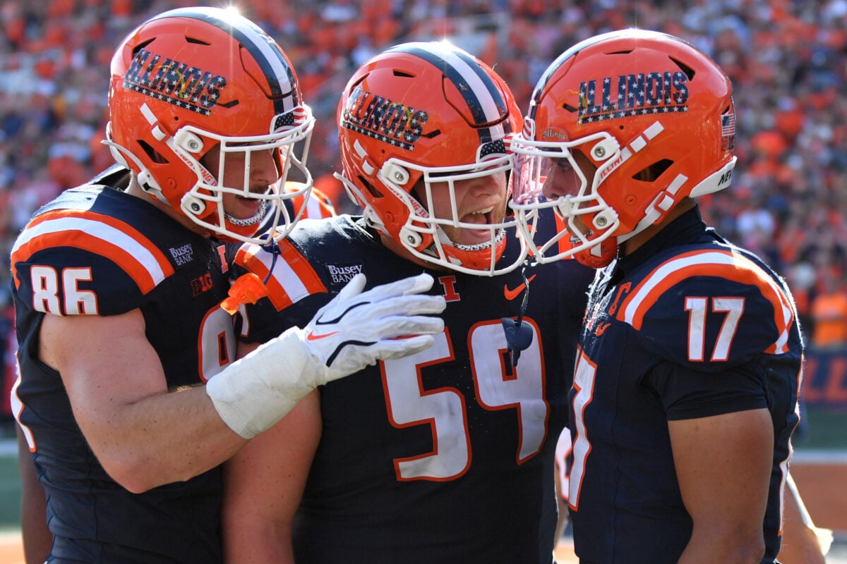Sep 12, 2026; Champaign, Illinois, USA; Illinois Fighting Illini tight end Christian Abney (86) and Jake Renfro (59) react with wide receiver Collin Dixon (17) after he scored a touchdown during the first half at against the Duke Blue Devils at Gies Memorial Stadium. Mandatory Credit: Ron Johnson-Imagn Images