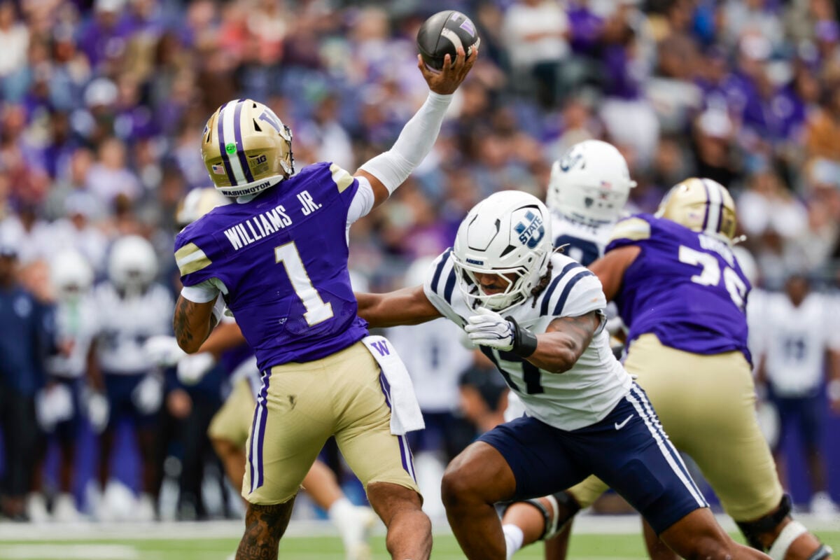 Sep 12, 2026; Seattle, Washington, USA; Utah State Aggies linebacker Jordan Pendleton (17) pressures Washington Huskies quarterback Demond Williams Jr. (1) into throwing an incomplete pass during the third quarter at Husky Stadium. Mandatory Credit: Joe Nicholson-Imagn Images
