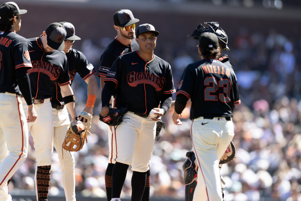 Sep 12, 2026; San Francisco, California, USA; San Francisco Giants starting pitcher Cesar Perdomo (with ball) gets removed for a reliever during the sixth inning against the San Diego Padres at Oracle Park. Mandatory Credit: D. Ross Cameron-Imagn Images