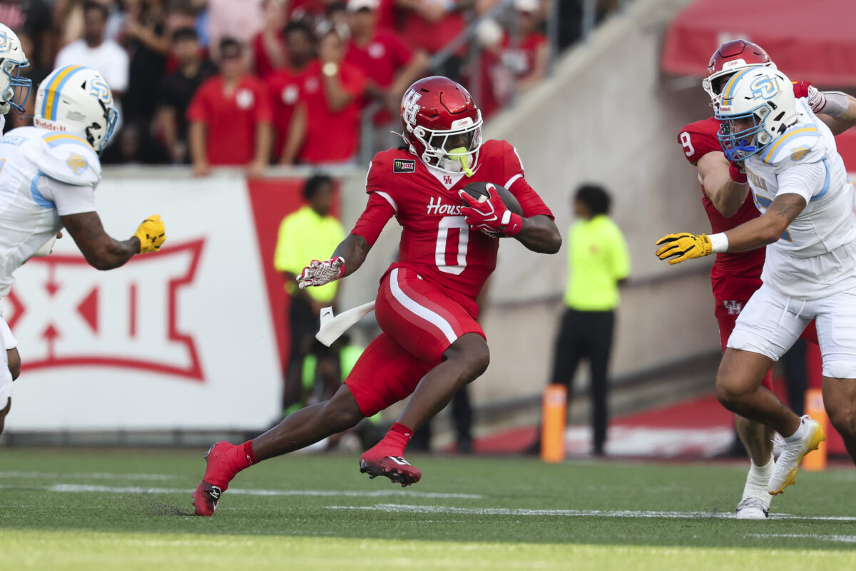 Sep 12, 2026; Houston, Texas, USA; Houston Cougars wide receiver Amare Thomas (0) runs with the ball after a reception during the first quarter against the Southern University Jaguars at TDECU Stadium. Mandatory Credit: Troy Taormina-Imagn Images