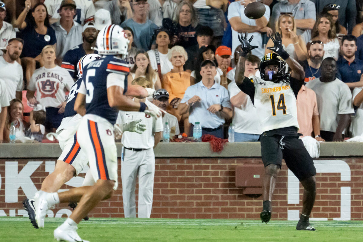 Southern Miss Golden Eagles running back Steven Robinson (14) catches a touchdown pass as Auburn Tigers take on Southern Miss Golden Eagles at Jordan-Hare Stadium in Auburn, Ala. on Saturday, Sept. 12, 2026. Auburn Tigers lead Southern Miss Golden Eagles 27-8 at halftime.