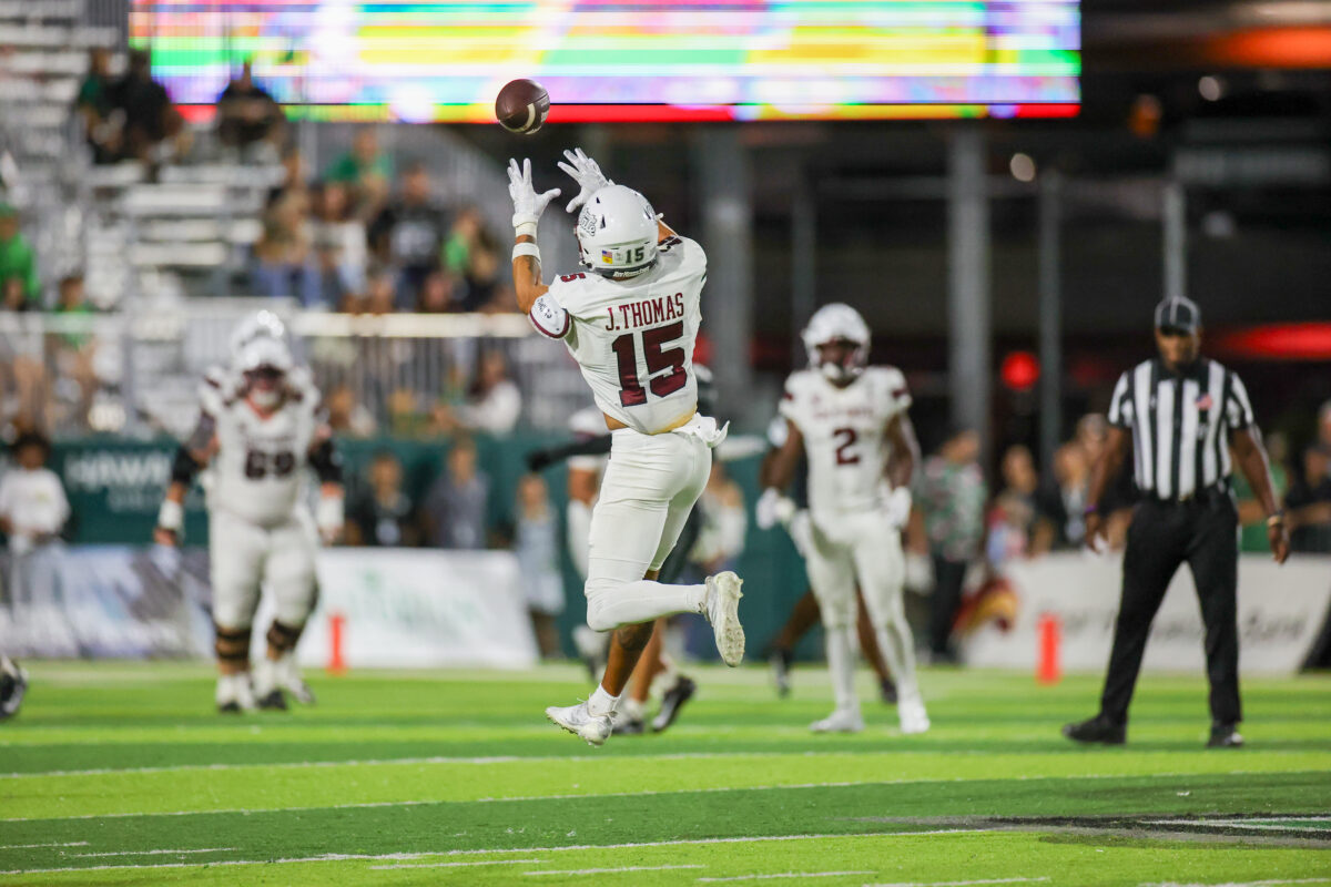 Sep 12, 2026; Honolulu, Hawaii, USA;  New Mexico State Aggies tight end Josiah Thomas (15) makes a catch against the Hawaii Rainbow Warriors during the fourth quarter at the Clarence T.C. Ching Athletics Complex.  Mandatory Credit: Marco Garcia-Imagn Images
