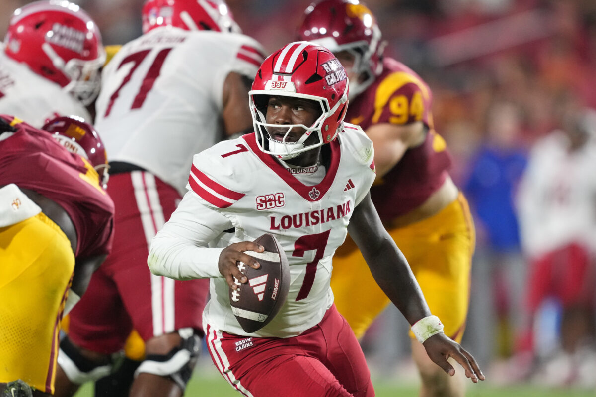 Sep 12, 2026; Los Angeles, California, USA; Louisiana Ragin' Cajuns quarterback Lunch Winfield (7) throws the ball against the Southern California Trojans in the second half at United Airlines Field at Los Angeles Memorial Coliseum. Mandatory Credit: Kirby Lee-Imagn Images
