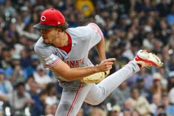 Sep 13, 2026; Milwaukee, Wisconsin, USA;  Cincinnati Reds starting pitcher Chase Burns (26) throws a pitch in the first inning against the Milwaukee Brewers at American Family Field.  Mandatory Credit: Benny Sieu-Imagn Images