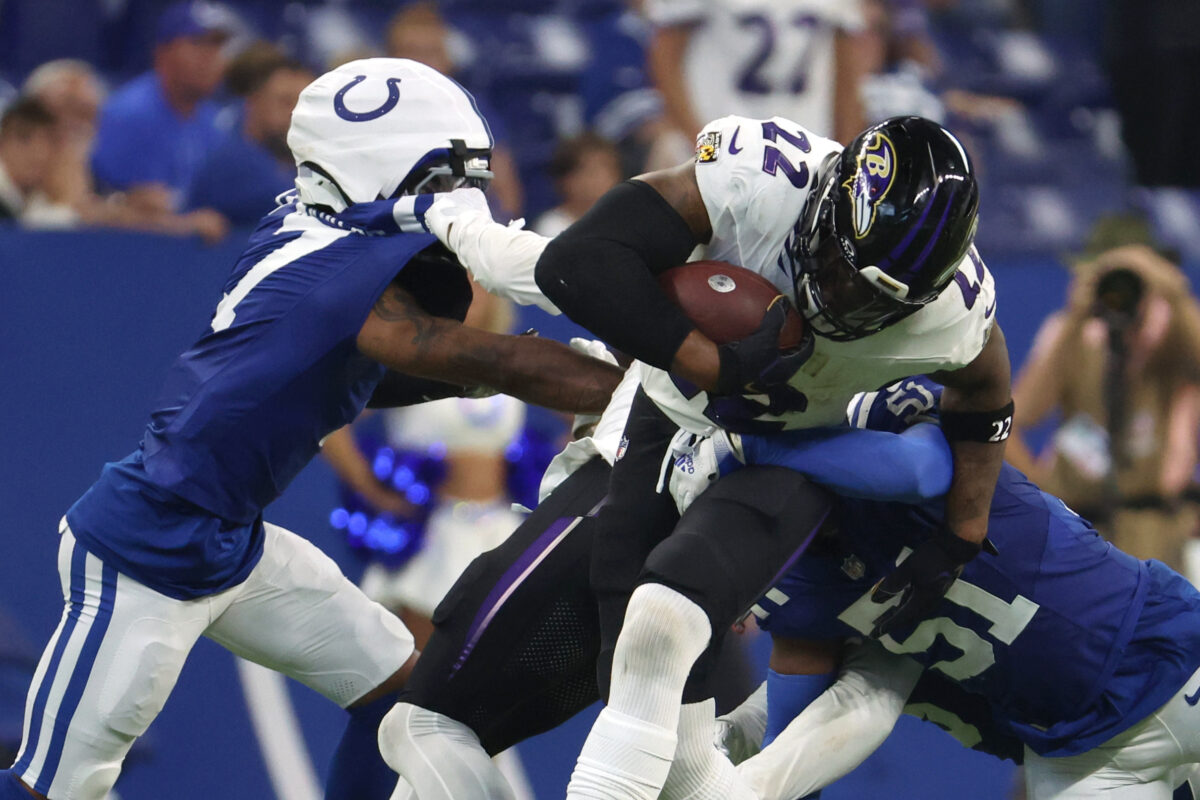 Sep 13, 2026; Indianapolis, Indiana, USA; Baltimore Ravens running back Derrick Henry (22) runs with the ball against the Indianapolis Colts during the second half at Lucas Oil Stadium. Mandatory Credit: Trevor Ruszkowski-Imagn Images