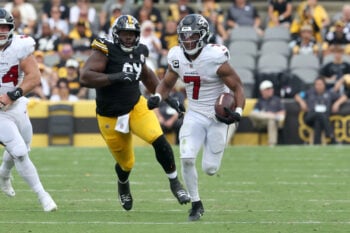 Sep 13, 2026; Pittsburgh, Pennsylvania, USA;  Atlanta Falcons running back Bijan Robinson (7) runs during the third quarter against the Pittsburgh Steelers at Acrisure Stadium.  Mandatory Credit: Charles LeClaire-Imagn Images