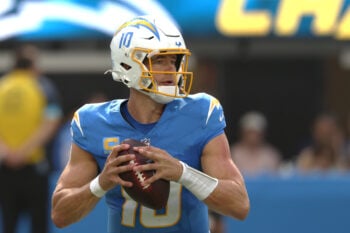Sep 13, 2026; Inglewood, California, USA;  Los Angeles Chargers quarterback Justin Herbert (10) looks downfield against the Arizona Cardinals during the fourth quarter at SoFi Stadium.  Mandatory Credit: Kiyoshi Mio-Imagn Images
