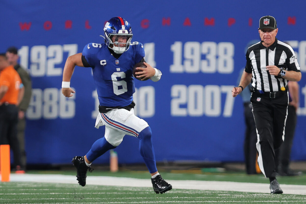 Sep 13, 2026; East Rutherford, New Jersey, USA;  New York Giants quarterback Jaxson Dart (6) scrambles with the ball against the Dallas Cowboys during the second quarter at MetLife Stadium.  Mandatory Credit: Brad Penner-Imagn Images