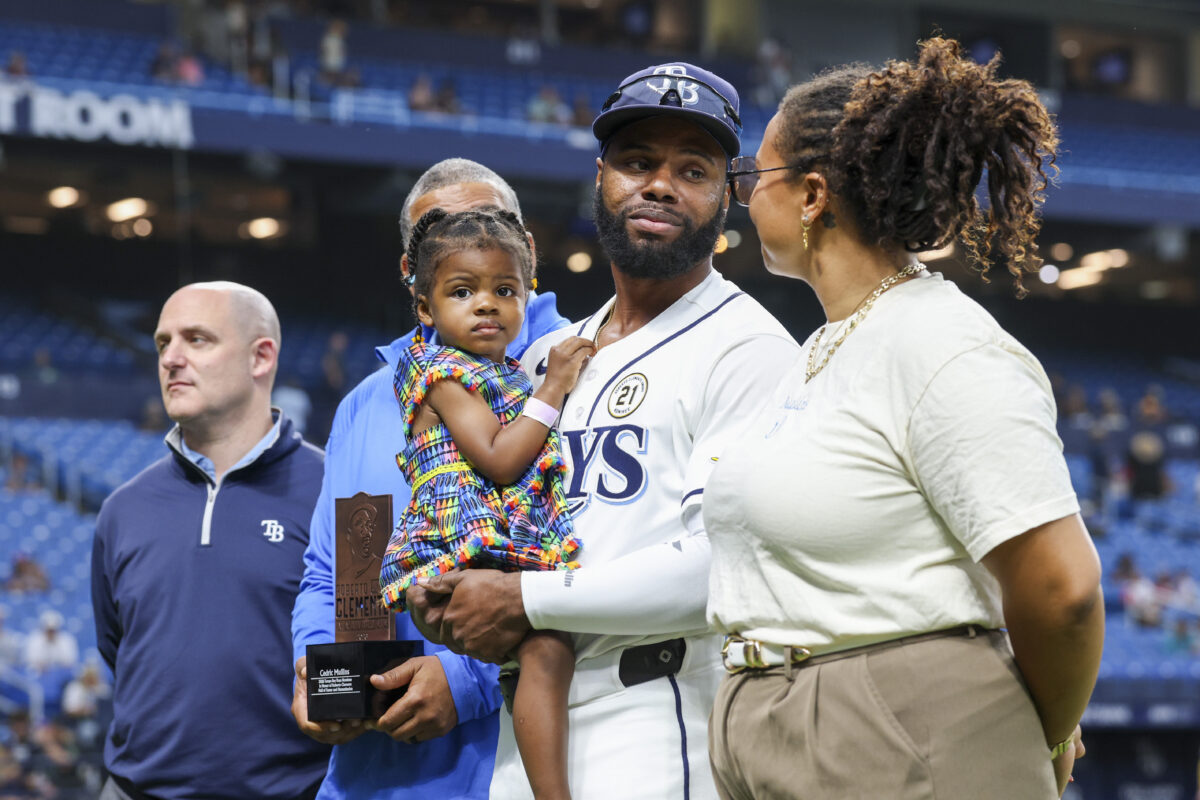 Sep 15, 2026; St. Petersburg, Florida, USA; Tampa Bay Rays center fielder Cedric Mullins (31) receives the Roberto Clemente nomination before a game against the Athletics at Tropicana Field. Mandatory Credit: Nathan Ray Seebeck-Imagn Images