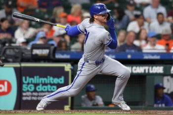 Sep 15, 2026; Houston, Texas, USA; Kansas City Royals shortstop Bobby Witt Jr. (21) hits a single during the fourth inning against the Houston Astros at Daikin Park. Mandatory Credit: Troy Taormina-Imagn Images