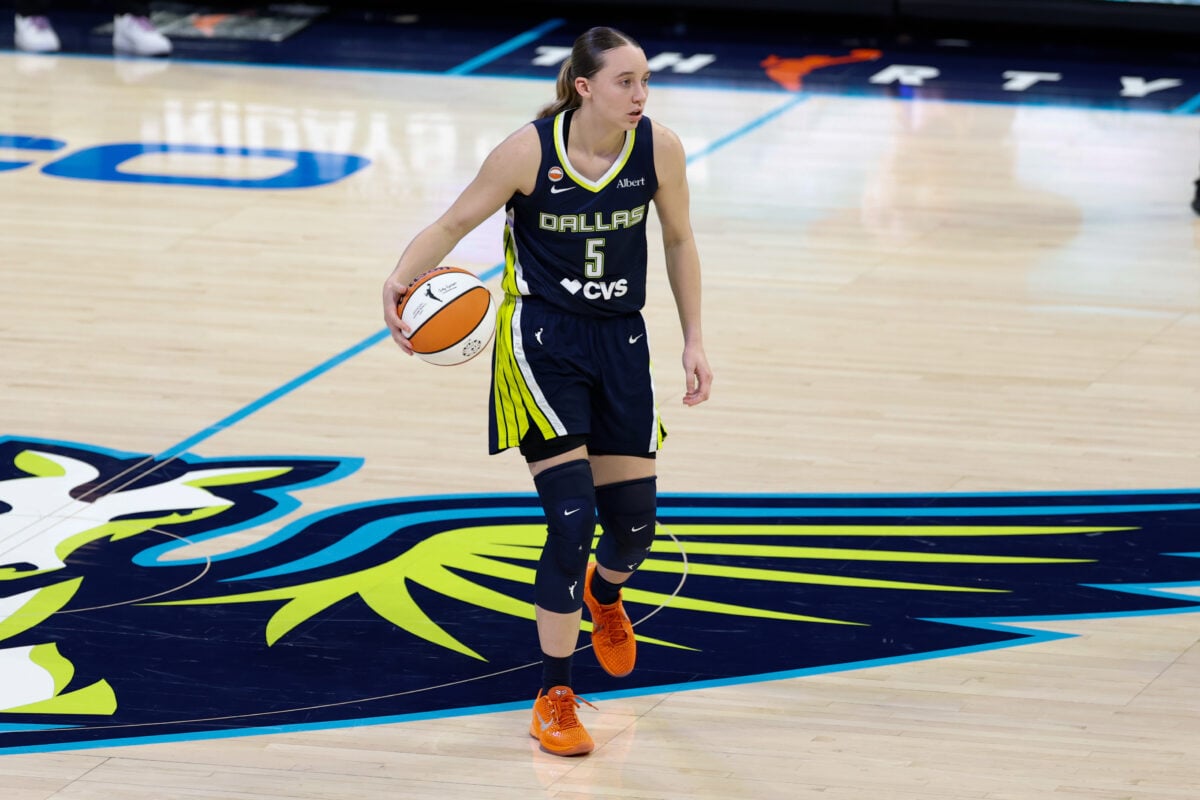 Sep 17, 2026; Arlington, Texas, USA;  Dallas Wings guard Paige Bueckers (5) dribbles against the Los Angeles Sparks during the second half at College Park Center.  Mandatory Credit: Chris Jones-Imagn Images
