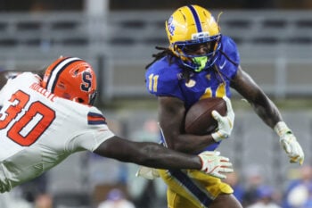 Sep 17, 2026; Pittsburgh, Pennsylvania, USA;  Pittsburgh Panthers quarterback Holden Geriner (11) with a 12 yard rush against Syracuse Orange at Acrisure Stadium.  Mandatory Credit: Charles LeClaire-Imagn Images