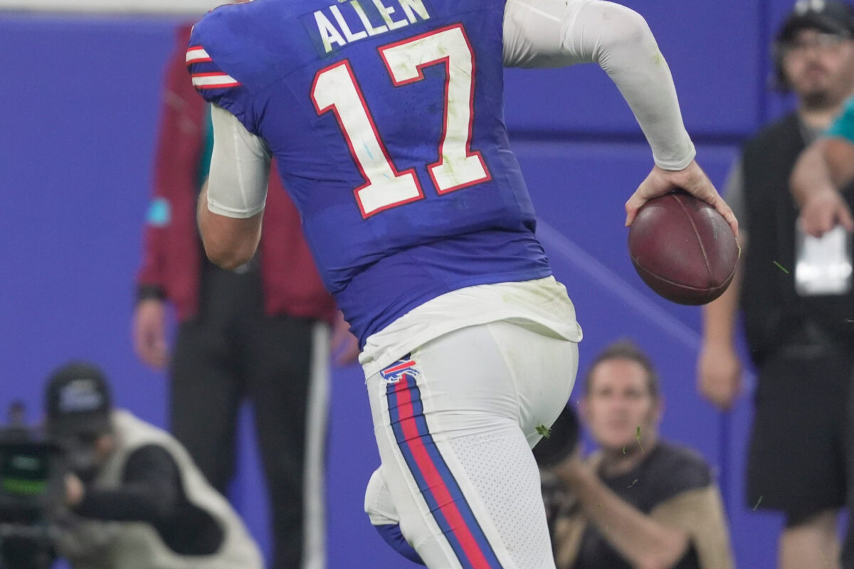 Bills Josh Allen runs towards the sidelines and extra yards during the second half at the Bills home opener game against the Detroit Lions on Sept. 17, 2026.