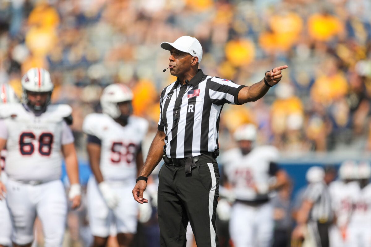 Sep 12, 2026; Morgantown, West Virginia, USA; Referee Tutashinda Salaam makes a call during the third quarter of the game between the West Virginia Mountaineers and the UT Martin Skyhawks at Milan Puskar Stadium. Mandatory Credit: Ben Queen-Imagn Images
