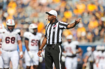 Sep 12, 2026; Morgantown, West Virginia, USA; Referee Tutashinda Salaam makes a call during the third quarter of the game between the West Virginia Mountaineers and the UT Martin Skyhawks at Milan Puskar Stadium. Mandatory Credit: Ben Queen-Imagn Images