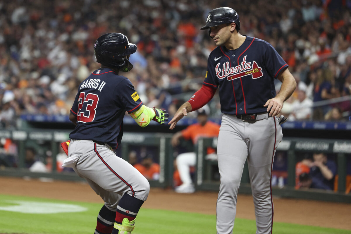 Sep 18, 2026; Houston, Texas, USA; Atlanta Braves center fielder Michael Harris II (23) celebrates with first baseman Matt Olson (28) after hitting a home run during the fourth inning against the Houston Astros at Daikin Park. Mandatory Credit: Troy Taormina-Imagn Images