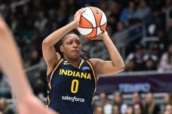 Sep 18, 2026; Toronto, Ontario, CAN;  Indiana Fever guard Kelsey Mitchell (0) shoots the ball against the Toronto Tempo in the first half at Coca-Cola Coliseum.  Mandatory Credit: Dan Hamilton-Imagn Images