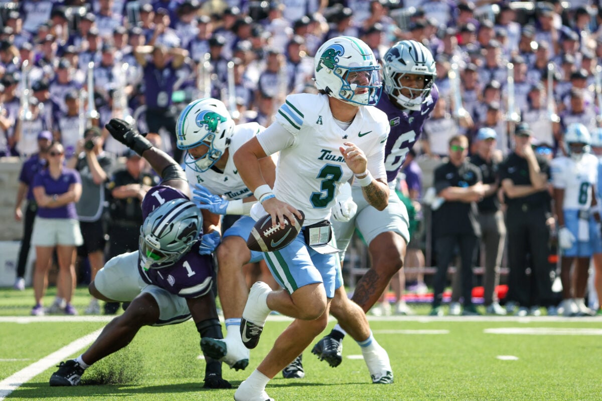 Sep 19, 2026; Manhattan, Kansas, USA;  Tulane Green Wave quarterback Kadin Semonza (3) is forced out of the pocket by Kansas State Wildcats defensive end Wendell Gregory (1) during the first quarter at Bill Snyder Family Football Stadium.  Mandatory Credit: Scott Sewell-Imagn Images