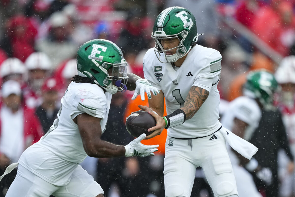 Sep 19, 2026; Madison, Wisconsin, USA;  Eastern Michigan Eagles quarterback Noah Kim (1) hands the football to running back Amareon Blue (15) during the second quarter against the Wisconsin Badgers at Camp Randall Stadium. Mandatory Credit: Jeff Hanisch-Imagn Images