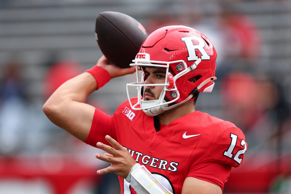 Sep 19, 2026; Piscataway, New Jersey, USA;  Rutgers Scarlet Knights quarterback Dylan Lonergan (12) warms up before the game against the USC Trojans at SHI Stadium. Mandatory Credit: Vincent Carchietta-Imagn Images