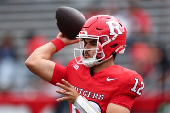 Sep 19, 2026; Piscataway, New Jersey, USA;  Rutgers Scarlet Knights quarterback Dylan Lonergan (12) warms up before the game against the USC Trojans at SHI Stadium. Mandatory Credit: Vincent Carchietta-Imagn Images