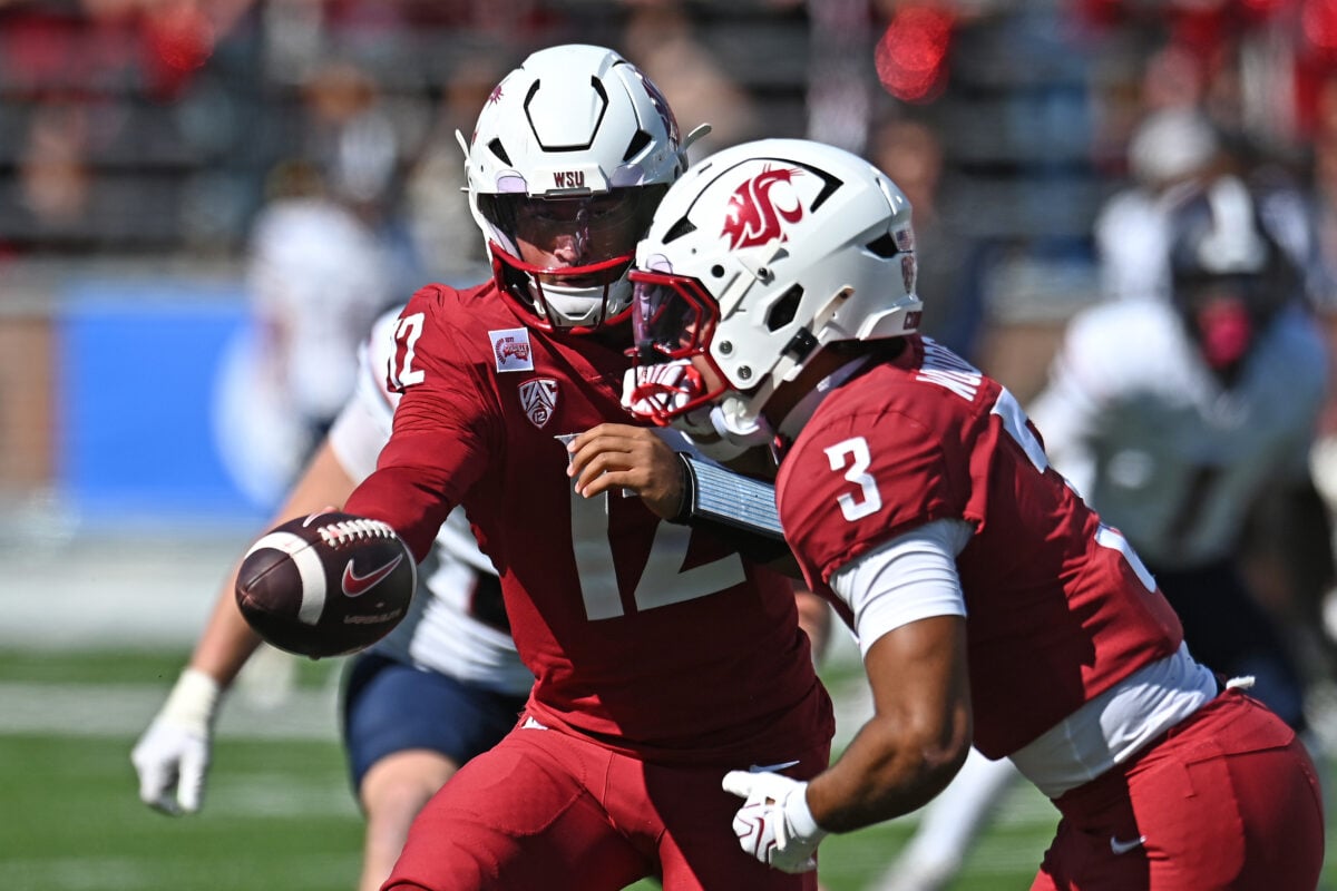 Sep 19, 2026; Pullman, Washington, USA;  Washington State Cougars running back Maxwell Woods (3) takes the hand off from quarterback Caden Pinnick (12) against the Duquesne Dukes during the first half at Gesa Field at Martin Stadium.  Mandatory Credit: James Snook-Imagn Images