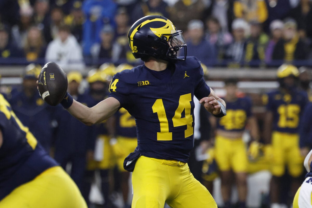Sep 19, 2026; Ann Arbor, Michigan, USA; Michigan Wolverines quarterback Tommy Carr (14) makes a throw against the Texas El Paso Miners during the fourth quarter at Michigan Stadium. Mandatory Credit: Rick Osentoski-Imagn Images
