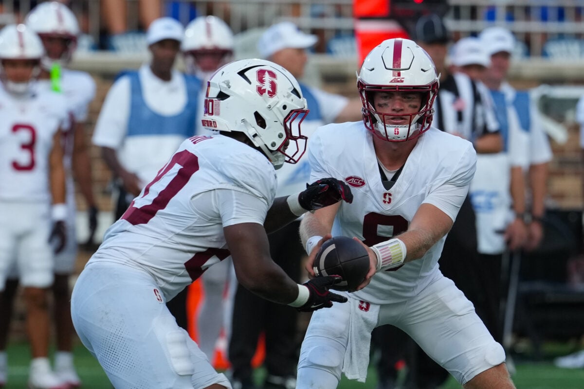 Sep 19, 2026; Durham, North Carolina, USA;  Stanford Cardinal quarterback Davis Warren (8) hands off the ball to running back Micah Ford (20) against the Duke Blue Devils during the second half at Wallace Wade Stadium.  Mandatory Credit: James Guillory-Imagn Images
