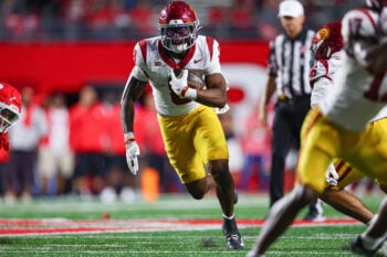 Sep 19, 2026; Piscataway, New Jersey, USA;  USC Trojans running back King Miller (8) carries the ball against the Rutgers Scarlet Knights during the second half at SHI Stadium. Mandatory Credit: Vincent Carchietta-Imagn Images